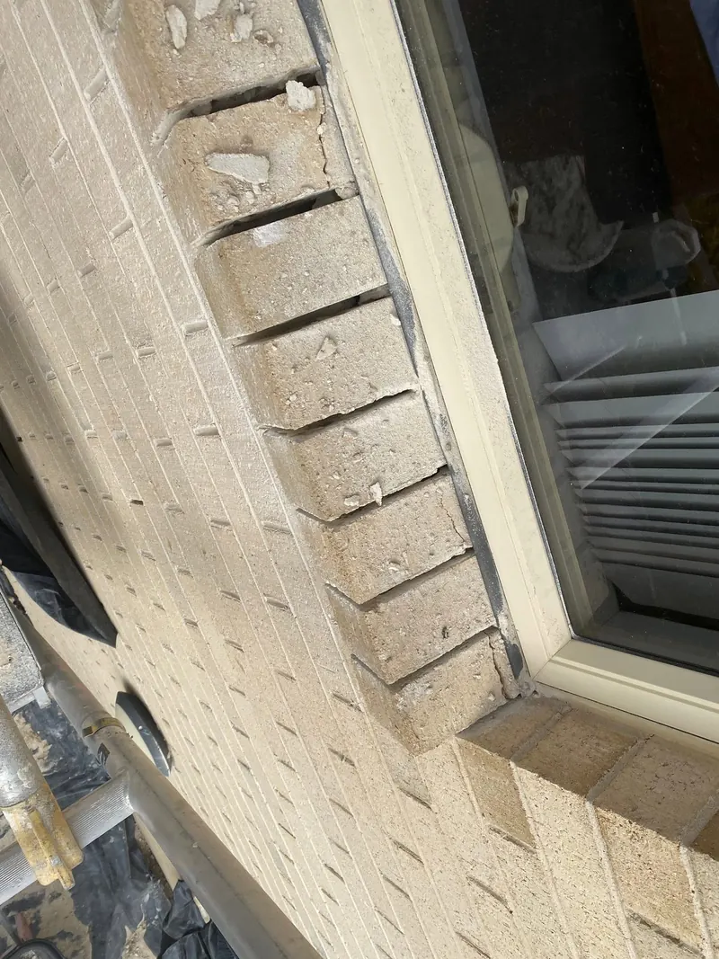 Close detail of a brick sill under a window